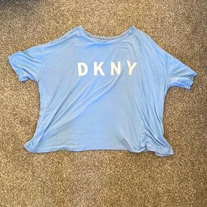 DKNY Sport shirt, light blue shirt with white lettering in a size medium.